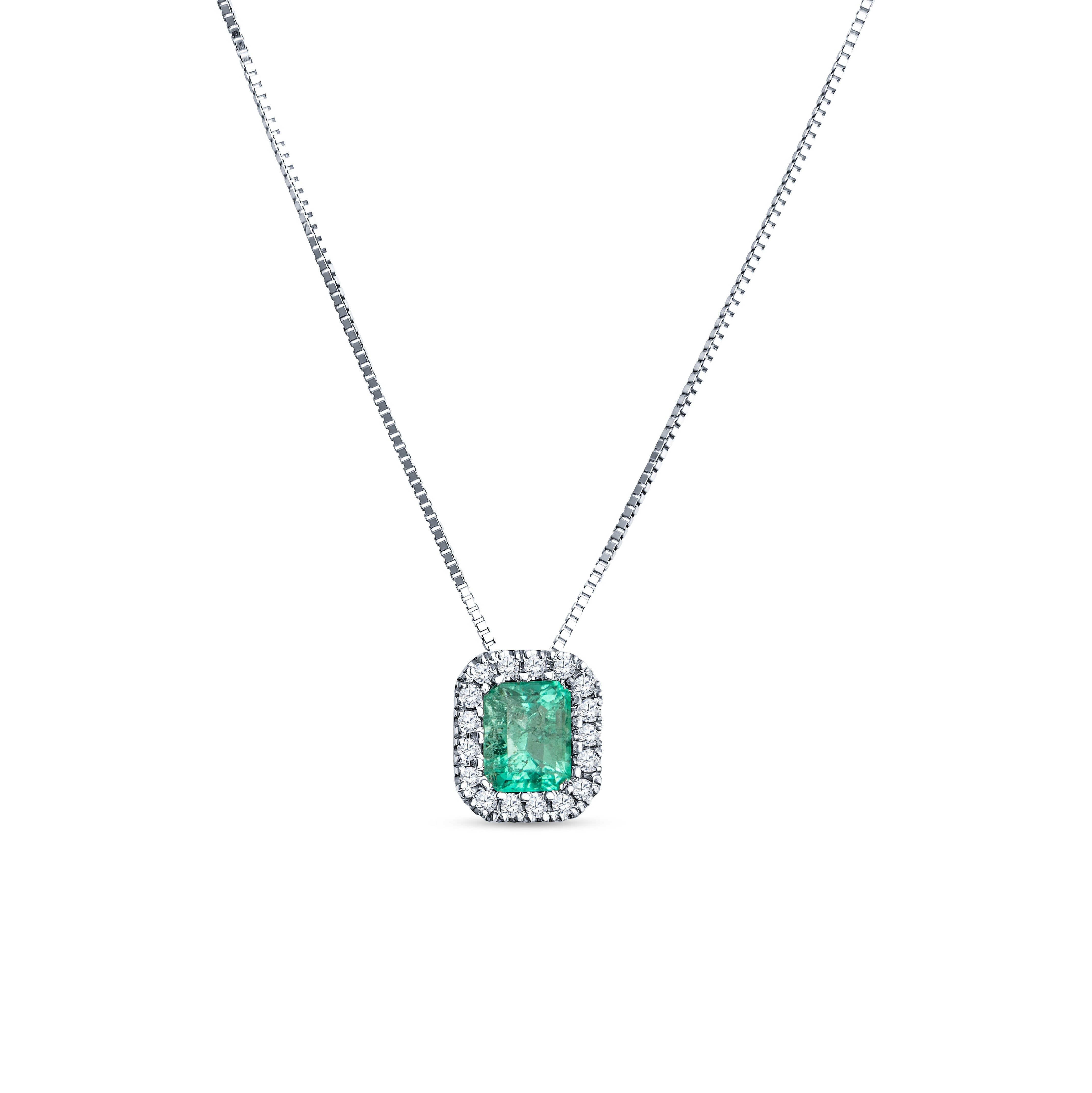 Colombian emerald cut diamond halo pendant in 18K gold