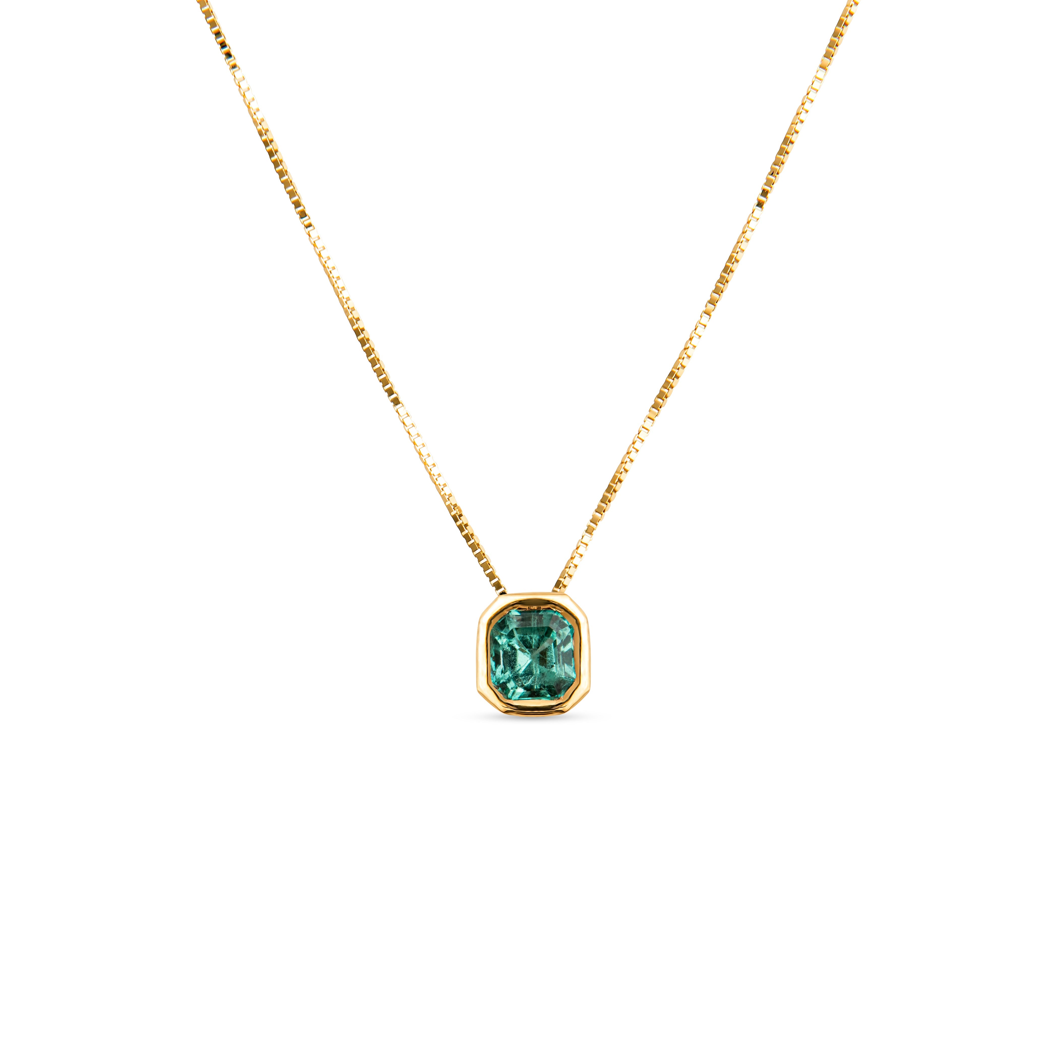 Colombian emerald bezel solitaire pendant in 18K gold